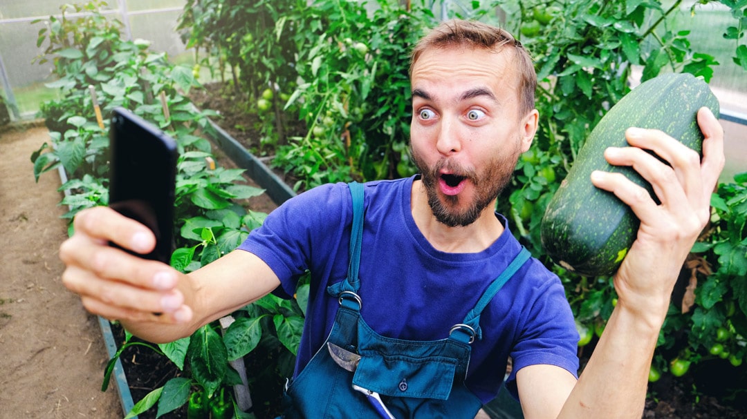Happy man gardening