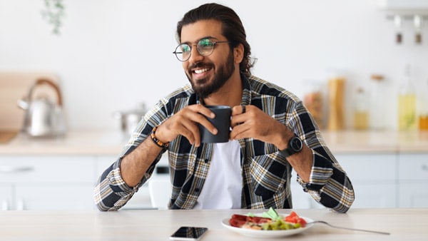 Happy South Asian man