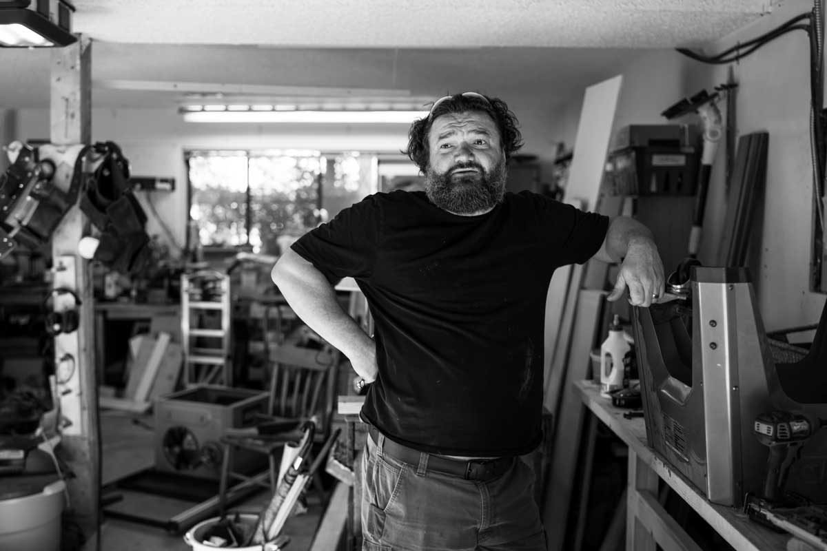 Toby Hargrave in his garage thinking