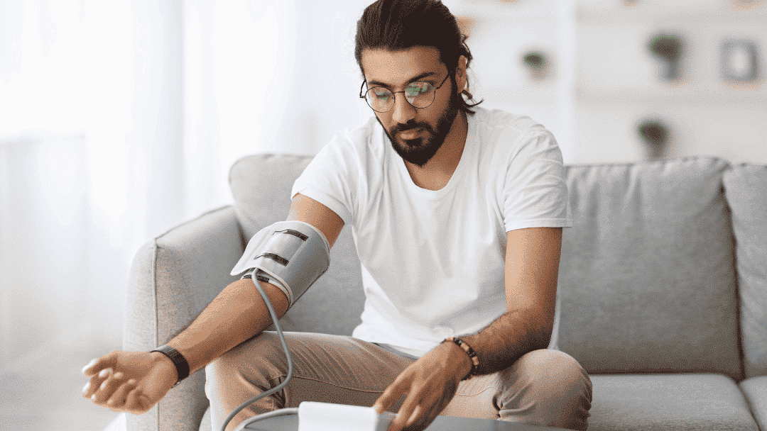 South Asian Man Taking Blood Pressure